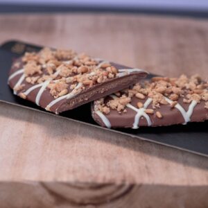 Coca de xocolata amb llet i gianduja de pacanes